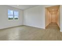 Bright and airy living room with tile flooring at 176 Flag Lilly Ln, Umatilla, FL 32784