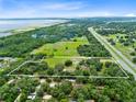 Large lot with home and highway frontage at 950 S Narcoossee Rd, St Cloud, FL 34771