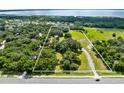 Large lot with home and highway frontage at 950 S Narcoossee Rd, St Cloud, FL 34771
