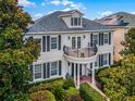 Stunning two-story home with a balcony at 7714 Excitement Dr, Reunion, FL 34747
