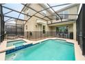 Private pool and spa with a screened enclosure at 2744 Bookmark Dr, Kissimmee, FL 34746