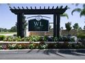 West Lucaya Village Resort entrance sign with landscaping at 3227 Cupid Pl, Kissimmee, FL 34747
