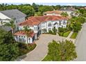 Stunning two-story home with a large yard at 7459 Gathering Dr, Reunion, FL 34747