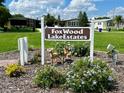 FoxWood Lake Estates community entrance sign with landscaping at 5013 Foxwood Blvd, Lakeland, FL 33810