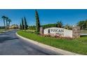 Tuscan Hills community entrance with stone signage at 730 Brunello Dr, Davenport, FL 33897