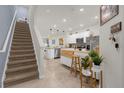 Open concept kitchen with an island and stainless steel appliances at 4801 Sparkling Shell Ave, Kissimmee, FL 34746