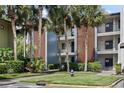 Two-story building with landscaping and fire hydrant at 15 Escondido Cir # 141, Altamonte Springs, FL 32701