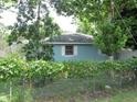 Back exterior view of a light blue single story home at 1632 N Fullers Cross Rd, Winter Garden, FL 34787