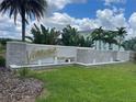 Community entrance sign with water feature and landscaping at 1735 Oak Blossom Dr, Davenport, FL 33837