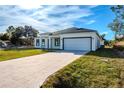 Modern one story home with large driveway and spacious backyard at 1306 Congo Dr, Poinciana, FL 34759