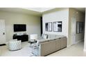 Relaxing living room with sectional sofa and large TV at 7740 Sandy Ridge Dr # 226, Kissimmee, FL 34747
