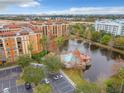 Apartment building with pool and parking at 12544 Floridays Resort Dr # 202B, Orlando, FL 32821
