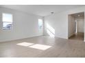 Bright and spacious living room with large windows and tile flooring at 4056 Bannock Ave, Tavares, FL 32778