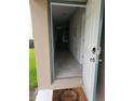 Open entryway with tiled flooring and views into the living room at 1629 Yellow Trl, Lakeland, FL 33801