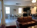Bright dining room featuring a large table perfect for Gathering gatherings at 5265 Oakbourne Ave, Davenport, FL 33837