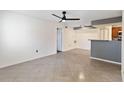 Spacious living room with tile floors and ceiling fan at 3032 Parkway Blvd # 201, Kissimmee, FL 34747