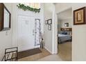 Bright entryway with access to a bedroom and lots of natural light at 241 Grosvenor Loop, Davenport, FL 33897