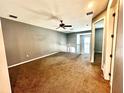 Loft bedroom with ceiling fan and carpet at 2106 Chatham Place Dr, Orlando, FL 32824