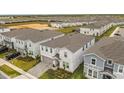Aerial view of houses and community at 3209 Lilac Way, Davenport, FL 33897