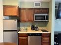 Well-equipped kitchenette with modern appliances at 3100 Parkway Blvd # 611, Kissimmee, FL 34747