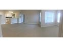 Bright living room with tile floors and neutral color palette at 2203 Key West Ct # 436, Kissimmee, FL 34741