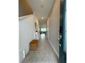 Bright and spacious entryway with tile flooring at 718 Longboat Dr, Davenport, FL 33896