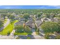 Community view showcasing a two-story house among others at 476 Calabay Parc Blvd, Davenport, FL 33897