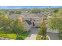 Two-story house with a large backyard, seen from above at 476 Calabay Parc Blvd, Davenport, FL 33897