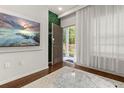 Light and bright entryway with view to backyard at 8968 Silver Pl, Kissimmee, FL 34747