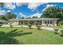 Ranch style home with a spacious driveway at 1500 8Th Se St, Winter Haven, FL 33880