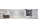 Living room with fireplace, ceiling fan, and sliding glass doors at 10633 Watertown Ct, Orlando, FL 32821
