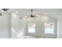 Bright and airy bedroom with high ceilings and two large windows at 160 Bob Thomas Cir, Sanford, FL 32771