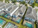 Aerial view of houses with private pools in a community at 4722 Sleepy Hollow Dr, Kissimmee, FL 34746