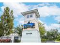 Fairview Grande waterfront condo community entrance at 4177 N Orange Blossom Trl # 210, Orlando, FL 32804