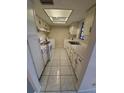 Galley-style kitchen with ample counter space and storage at 2616 Lemon Tree Ln # F, Orlando, FL 32839