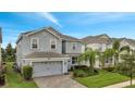 Two story house with a two car garage at 1536 Maidstone Ct, Davenport, FL 33896
