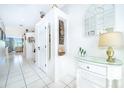 Bright entryway with white walls, tile floor, and decorative accents at 2918 Sunset Retreat Ct, Kissimmee, FL 34747