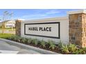 Mabel Place community entrance with stone pillars and signage at 648 Hennepin Loop, Lake Wales, FL 33898