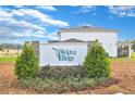 Community entrance sign for the WeKiva Ridge neighborhood at 3896 Deer Ridge Dr, Mount Dora, FL 32757