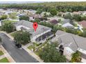 Aerial view of home and surrounding neighborhood at 2078 Cypress Bay Blvd, Kissimmee, FL 34743