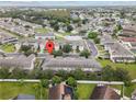 Aerial view showing home's location in a residential neighborhood at 2078 Cypress Bay Blvd, Kissimmee, FL 34743
