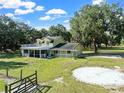 Two-story house with a large deck and yard at 4350 E Hinson Ave, Haines City, FL 33844