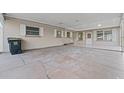 Covered carport with concrete slab and space for parking at 912 Avenue T Se, Winter Haven, FL 33880