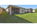 Spacious backyard with screened patio at 1294 Harbor Ridge Dr, Kissimmee, FL 34759