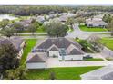 Property showcasing a house and surrounding neighborhood at 123 Gulf Dr, Kissimmee, FL 34759