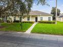 Single-story house with a well-maintained lawn and walkway at 123 Gulf Dr, Kissimmee, FL 34759