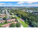 Aerial view of condo community and surrounding area at 4611 Gate Pl # H-203, Orlando, FL 32811