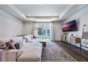 Spacious living room with large sectional sofa and sliding glass doors at 2195 Bluebird Pl, St Cloud, FL 34771