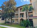 Two-story building with multiple apartments at 907 Charo Pkwy # 933, Davenport, FL 33897