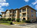 Two-story building with multiple apartments at 907 Charo Pkwy # 933, Davenport, FL 33897